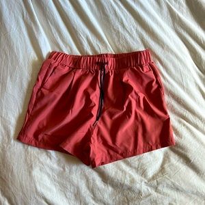 NWOT Halara workout shorts red orange color womens medium